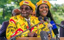 FILE: Former Zimbabwe President Robert Mugabe (left) and his wife Grace Mugabe at a Zanu-PF rally on 8 November, 2017. Picture: AFP