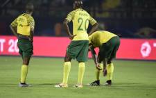 South African players react after losing the 2019 Africa Cup of Nations (CAN) Group B football match against Morocco at the Al Salam Stadium in the Egyptian capital Cairo on 1 July 2019. Picture: AFP