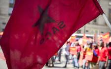FILE: An SACP flag flies during a protest. Picture: Reinart Toerien/EWN