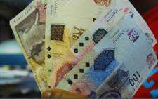 The rand fell to 10.3735 to the dollar at 1557 GMT, off a 10.3445 close in New York on Friday.