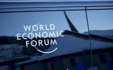A chapel is reflected on the side of a World Economic Forum shuttle bus in Davos, Switzerland on 18 January 2017. PIcture: Reinart Toerien/EWN.