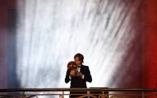 Real Madrid's Croatian midfielder Luka Modric brandishes the trophy after receiving the 2018 FIFA Men's Ballon d'Or award for best player of the year during the 2018 FIFA Ballon d'Or award ceremony at the Grand Palais in Paris on Monday. Picture: AFP