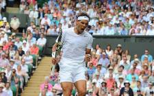 FILE: Rafa Nadal celebrates after he claimed his 700th main tour win at Wimbledon against Slovakian Martin Klizan on 24 June 2014. Picture: Facebook.