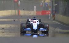 George Russell encounters trouble with a drain cover with practice for the day being called off. Picture: Formula 1.com
