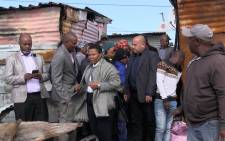 Human Settlements Minister Nomaindia Mfeketo along with Social Development Minister Susan Shabangu visited Taiwan Informal Settlement in Khayelitsha on 8 May 2018. Eight people – including five children - died in a shack fire in this community on Monday. Picture: Bertram Malgas