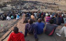 FILE: Protesters from Lonmin's Marikana Mine in the North West sit on a nearby hill, awaiting instruction from their leaders. Picture: EWN.