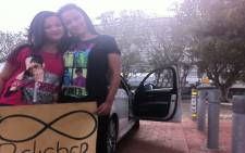 This mom and daughter were camped out at the Cape Town Stadium since the day before Justin Bieber was set to perform. Picture: Graeme Raubenheimer/EWN