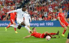 Danny Welbeck glides the ball into the back of the net during the Euro 2016 qualifiers on 8 September 2014. Picture: Official England Football Facebook Page