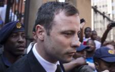 FILE: Oscar Pistorius leaves the High Court in Pretoria after the reading of judgment in his murder trial on 12 September 2014. Picture: Christa Eybers/EWN.
