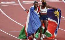 Namibia's Christine Mboma (L) celebrates with Namibia's Beatrice Masilingi after taking silver in the women's 200m final during the Tokyo 2020 Olympic Games at the Olympic Stadium in Tokyo on 3 August 2021. Picture: Giuseppe Cacace/AFP