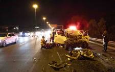 ER24 attend a motor vehicle accident involving a Toyota Hilux and a container truck. Picture: Thomas Holder/EWN