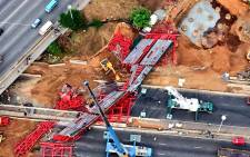 An aerial view of the scene of the collapsed temporary bridge over the M1 in Sandton where scaffolding caved in passing cars, killing three people and injuring 22. Picture: Aki Anastasiou/EWN.