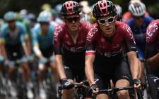 Great Britain's Geraint Thomas (R) rides with cyclists during the sixth stage of the 106th edition of the Tour de France cycling race between Mulhouse and La Planche des Belles Filles, on 11 July 2019. Picture: AFP
