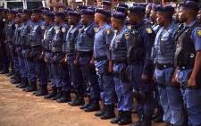 More than three dozen public order police lined up and ready to make sure all is peaceful at the Union Buildings. Picture: Barry Bateman/EWN.