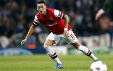Arsenal's German midfielder Mesut Ozil controls the ball during the UEFA Champions League Group F match against Arsenal on 1 October, 2013. Picture: AFP 