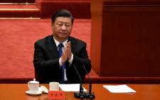 FILE: Chinese President Xi Jinping attends the commemoration of the 110th anniversary of the Xinhai Revolution which overthrew the Qing Dynasty and led to the founding of the Republic of China, at the Great Hall of the People in Beijing on 9 October 2021. Picture: AFP