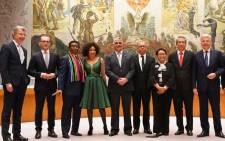 Foreign Ministers and UN Ambassadors from Germany, South Africa, Dominican Republic, Indonesia, and Belgium, pose for photos on the floor of the Security Council after a General Assembly meeting to elect the five non-permanent members of the Security Council June 8. Picture: AFP