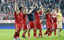 Bayern Munich players celebrate after beating Barcelona 4-0 in their first leg semifinal of the Champions League on 23 April 2013. Picture: AFP