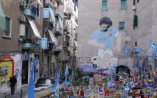 A general view shows a mural painting of late Argentinian football legend Diego Maradona at the so-called "Maradona square" in the Quartieri Spagnoli district of Naples on 23 November 2021. Picture: Carlo Hermann/AFP