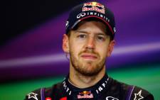 FILE: Sebastian Vettel and Infiniti Red Bull Racing talks to the media after winning the United States Formula One Grand Prix at Circuit of The Americas on 17 November, 2013 in Austin, United States. Picture:AFP.