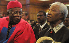 Acclaimed Nigerian author Chinua Achebe and former President Nelson Mandela chat on 12 September 2002 prior to Achebe receiving an honorary degree of Doctor of Literature and delivering the third Steve Biko Memorial Lecture at UCT. Picture: AFP