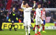 Real Madrid's Spanish defender Sergio Ramos celebrates at the end of the Spanish league football match between Club Atletico de Madrid and Real Madrid CF at the Wanda Metropolitano stadium in Madrid on 9 February 2019. Picture: AFP
