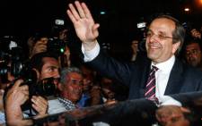 New Democracy leader Antonis Samaras celebrates. Picture: AFP