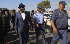 Police Minister Bheki Cele and Western Cape Police Commissioner Khombinkosi Jula visiting Browns Farms near Nyanga after the death of four people. Picture: Cindy Archillies/EWN.