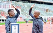 SA freestyle footballer Chris Njokwana (Left) set a new World Record for controlling a ball dropped from the highest altitude. Picture: Twitter/@KhristoJuggler.
