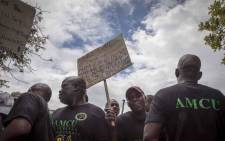 Amcu members outside the Brits Magistrates Court protest bail for the six murder accused appearing inside the court. Picture: Thomas Holder/EWN.