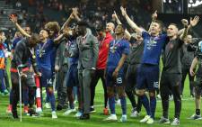 Manchester United's players celebrate after victory in the Uefa Europa League final football match Ajax Amsterdam v Manchester United on 24 May, 2017 at the Friends Arena in Solna outside Stockholm. Picture: AFP