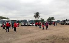 Teachers in red Sadtu shirts gather at the old Marabastad bus depot ahead of a planned march on 24 April 2013. Picture: Barry Bateman/EWN
