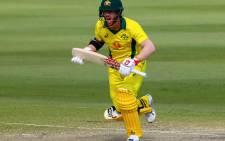 FILE: Australia batsman David Warner calls for a run. Picture: AFP