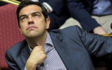 FILE: Former Greek Prime Minister Alexis Tsipras takes part in a session at the Greek Parliament in Athens on 10 July 2015. Picture: AFP.