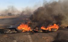 Protests against forced evictions are continuing into a second day in Hammanskraal and two people have been killed in the clashes. Picture: Vumani Mkhize/EWN.