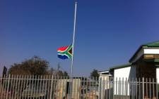 The South African flag flies at half-mast in honour of those who lost their lives in the Marikana shooting. Picture: Rahima Essop/EWN.