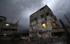 A destroyed Palestinian house on a rainy day in Al-Shejaeiya neighbourhood in the east of Gaza City, 19 October 2014. Picture: EPA.