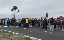 More than 200 residents have taken to the streets in anger, demanding land and housing. Picture: Kaylynn Palm/EWN.