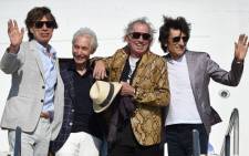 FILE. The Rolling Stones (L-R) Mick Jagger, Charlie Watts, Keith Richards and Ron Wood, are pictured upon landing in Montevideo on 15 February 2016. Picture: AFP