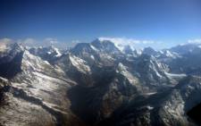 This photograph taken from an aircraft shows an aerial view of Mount Everest (C) and The Himalayan mountain range. Picture:AFP.
