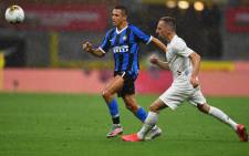 Inter Milan's Alexi Sanchez and Fiorentina's Franck Ribery chase after the ball during their Serie A match on 22 July 2020. Picture: @Inter_en/Twitter