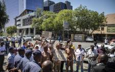 Representatives and coordinators of the #ShutdownGauteng movement marched outside the JSE on 9 October 2018, delivering a memorandum of demands to its officials. Picture: Thomas Holder/EWN