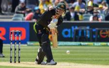Australian batsman David Warner hits the ball during the first international T20 cricket match between Australia and Sri Lanka at the Adelaide Oval on 27 October 2019. Picture: AFP