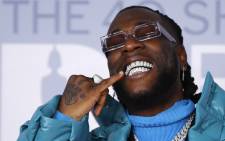 Nigerian singer-songwriter Burna Boy poses on the red carpet on arrival for the BRIT Awards 2020 in London on 18 February 2020. Picture: AFP
