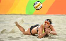 This file photo taken on 9 August 2016 shows Germany's Karla Borger diving for the ball during the women's beach volleyball qualifying match between Germany and the Netherlands at the Beach Volley Arena in Rio de Janeiro, for the Rio 2016 Olympic Games. Picture: AFP