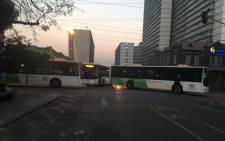 The Pretoria CBD was gridlocked on 29 July 2019 with stationary buses blocking several roads. It’s understood the disruption was caused by a bus driver strike. Picture: @JabuMoroko/Twitter.
