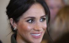 Meghan, Duchess of Sussex, smiles during a reception hosted by the Governor General at Admiralty House in Sydney on 16 October 2018. Picture: Steve Christo/POOL/AFP