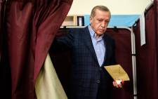 Turkish President Recep Tayyip Erdogan exits a voting booth at a polling station in Istanbul on 1 November 2015. Picture: AFP.