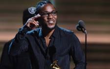 Kendrick Lamar recieveds the award for the Best Rap Album, 'To Pimp a Butterfly', during the 58th Annual Grammy music awards in Los Angeles on 15 February 2016. Picture:AFP