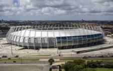 A handout photo released by the Brazilian Ministry of Tourism shows an aerial view of Castelao stadium in Fortaleza, Brazil, where Netherlands take on Mexico tonight. Picture: AFP 
